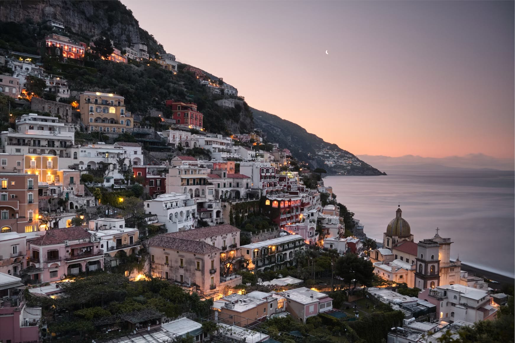The last lights of the day on Positano, on the Amalfi Coast, are a sight to behold.